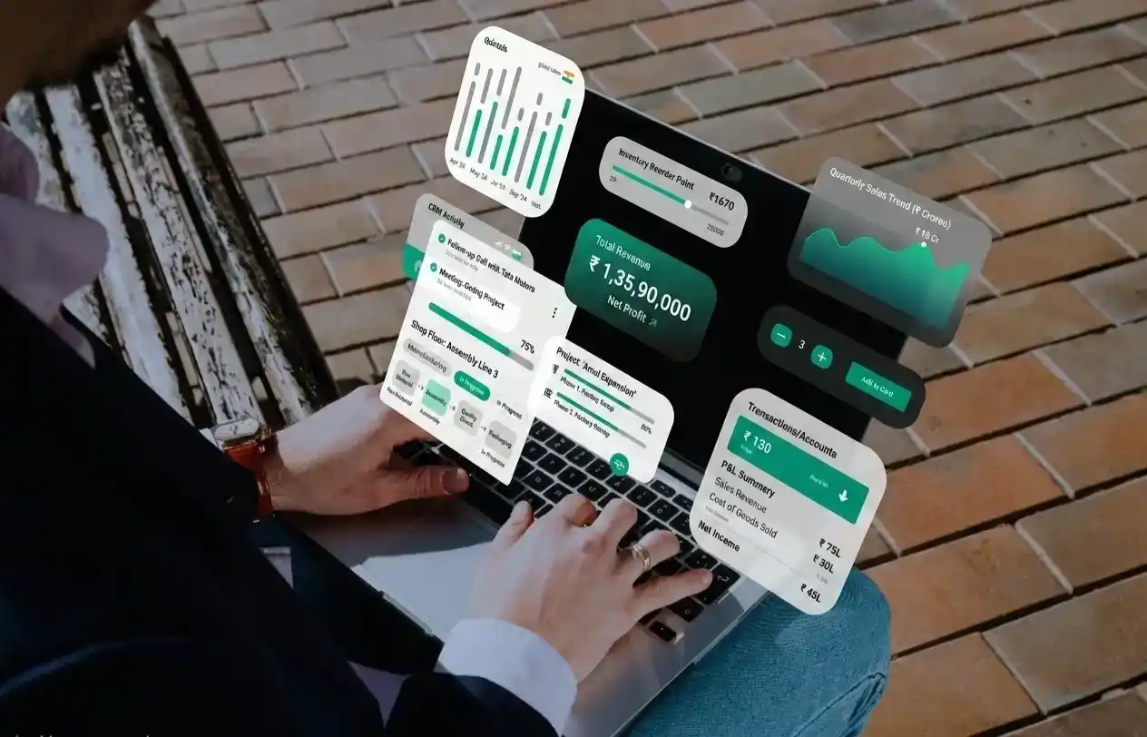 A person interacting with cloud-based-erp-software modules floating above a keyboard, highlighting seamless digital integration.