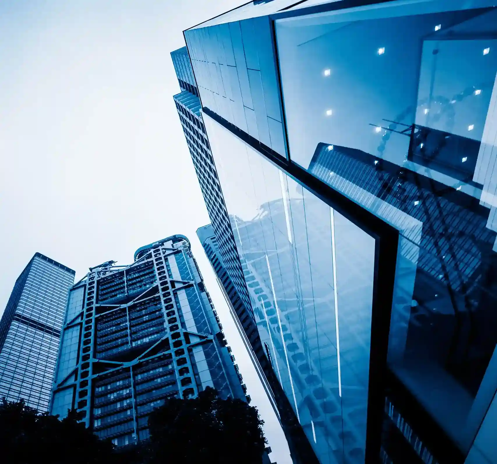 Modern enterprise corporate building with glass facade and high-rise architecture representing large-scale business operations.